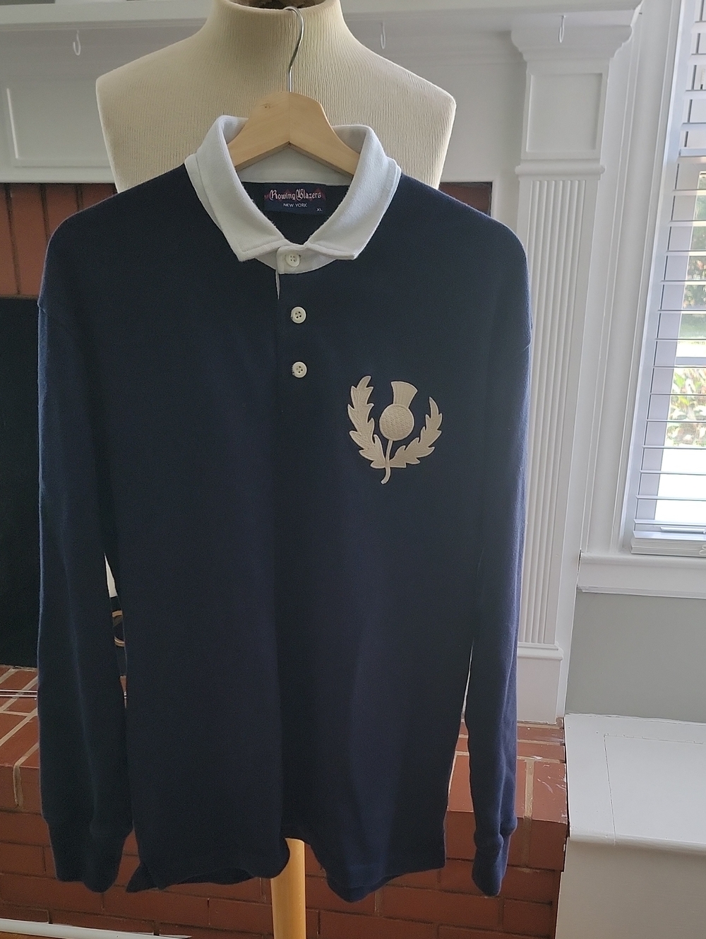 Rowing Blazers Navy Long-Sleeve Polo with White Collar and Cream Crest